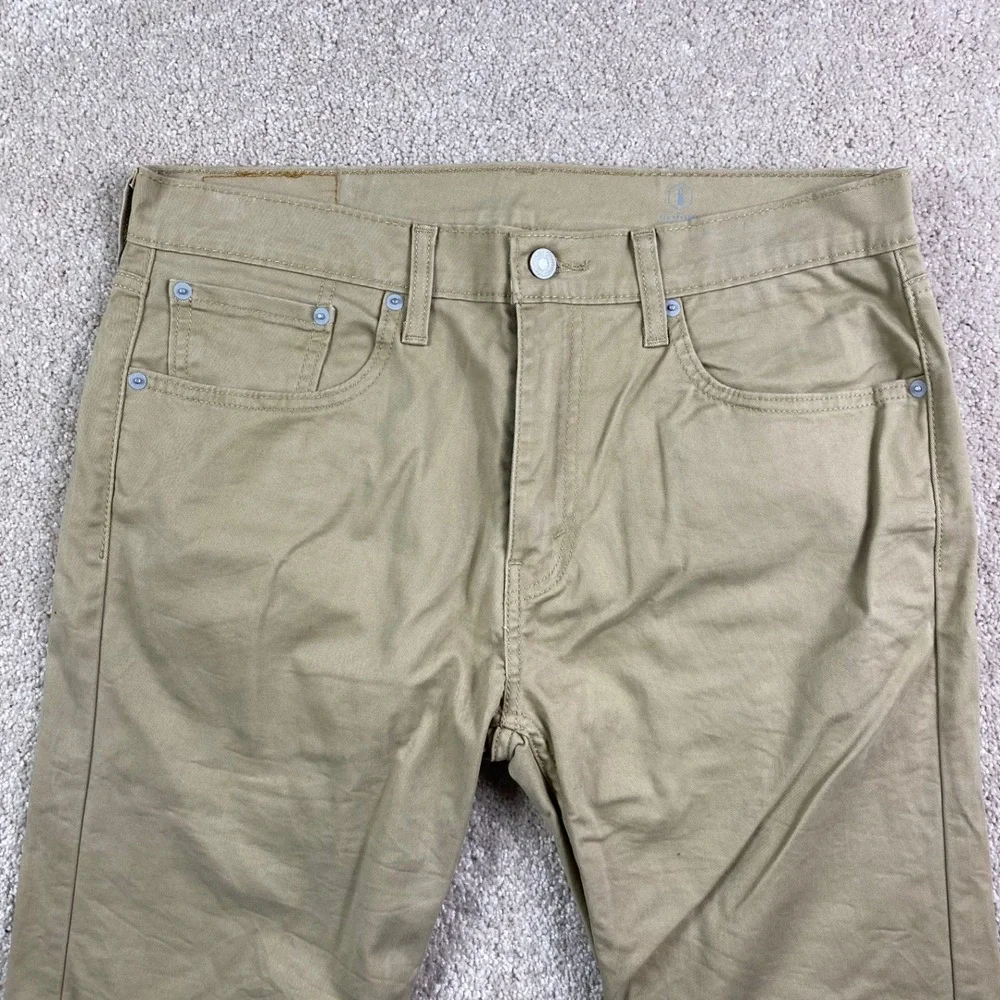 Levi's 502 Regular Taper All Seasons Tech Khaki Pants Mens 33x30 Tan Chinos